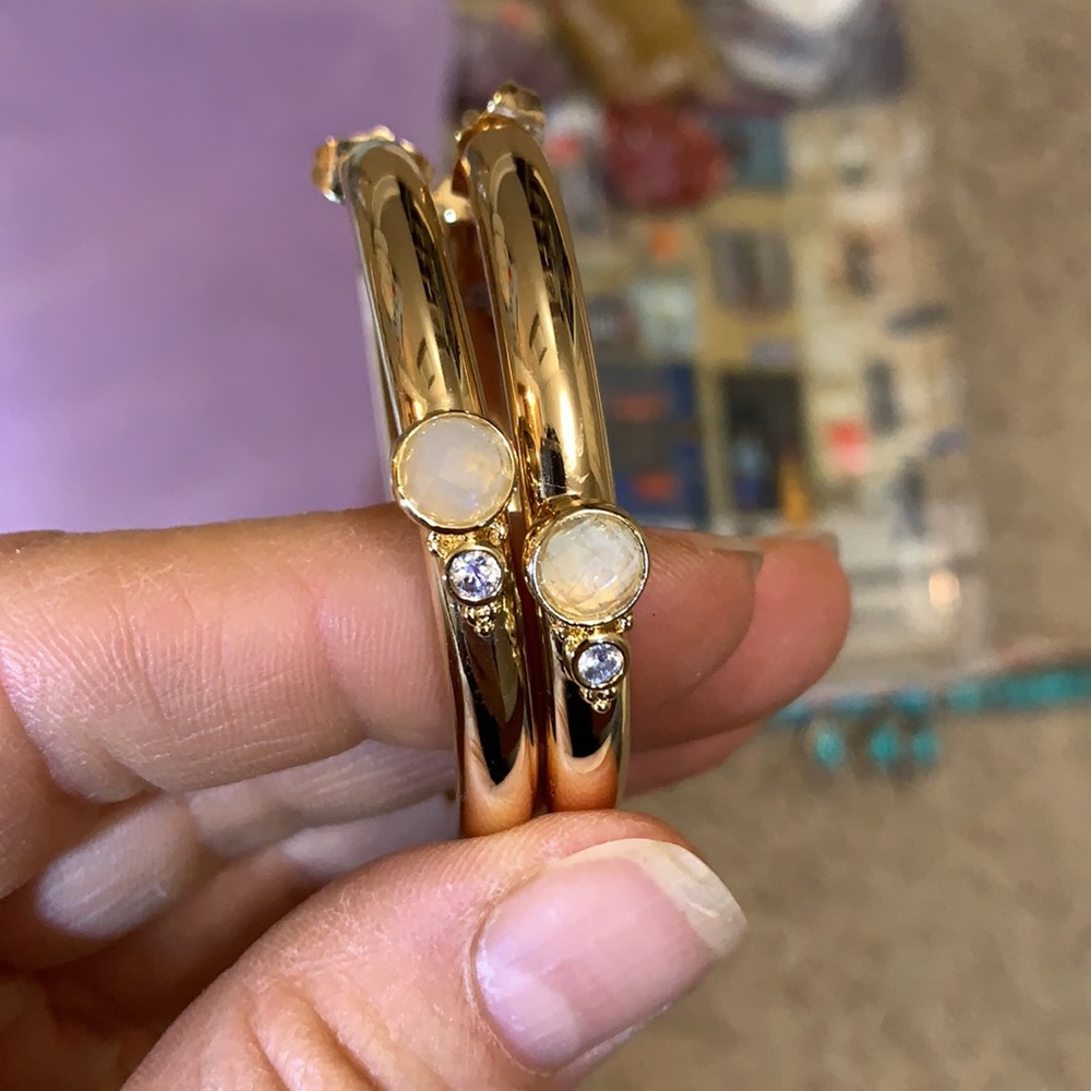 Stunning gold hoops with moonstone and crystal.